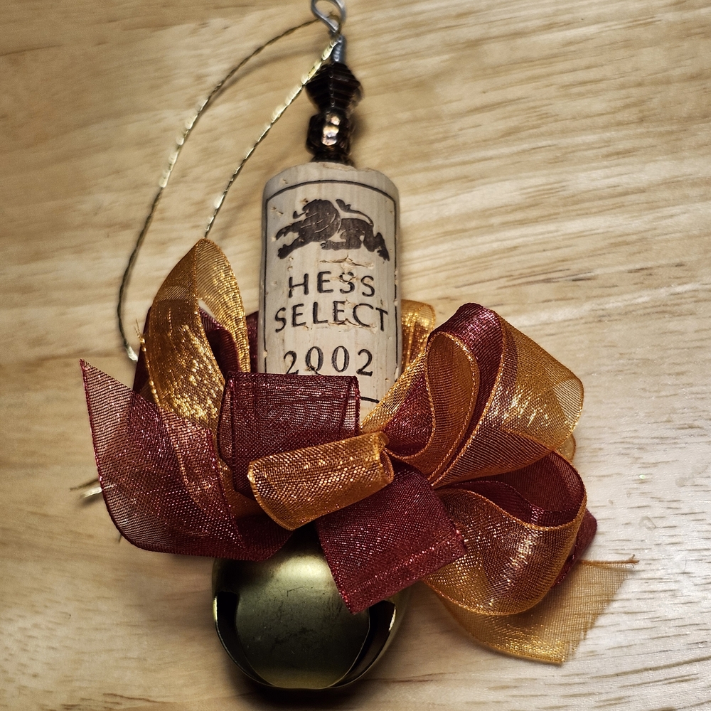 Hess Wine Cork Ornament with Red and Gold Ribbons